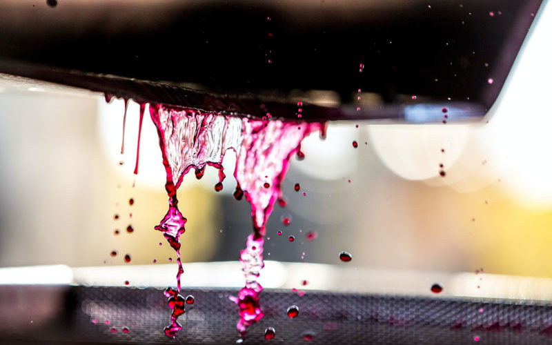 Grape juice in press machine during winemaking process