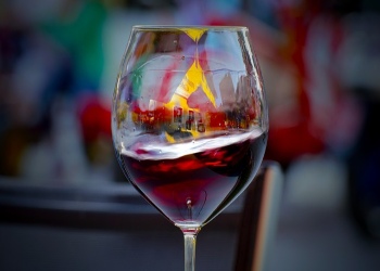 glass with wine in wine bars in Porto